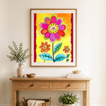 Finished vibrant layered petals cross stitch artwork displayed as home decor