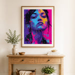 Finished vibrant neon portrait cross stitch artwork displayed as home decor