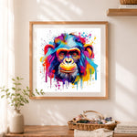 Finished vibrant pop‑art chimp portrait cross stitch artwork displayed as home decor