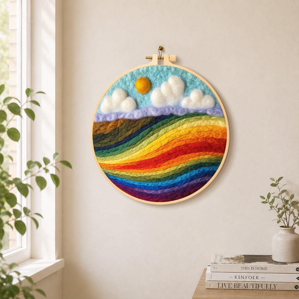 Vibrant rainbow color block landscape needle felt wall art displayed in a bright home interior