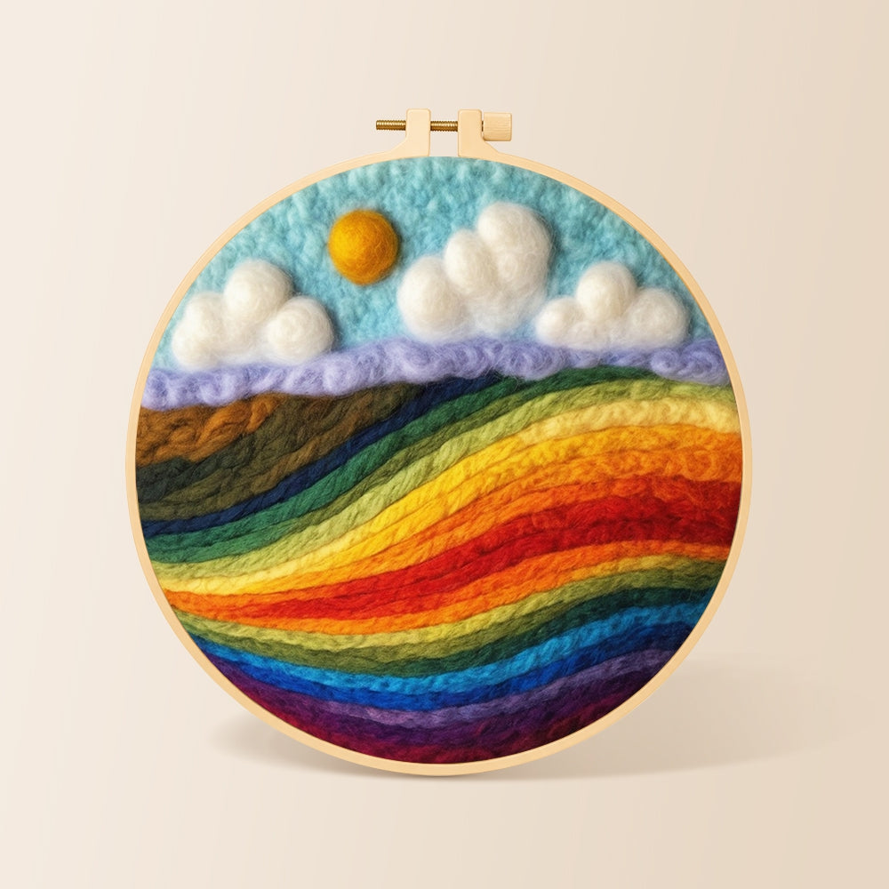 Vibrant rainbow color block landscape needle felting kit for beginners with a round wooden frame