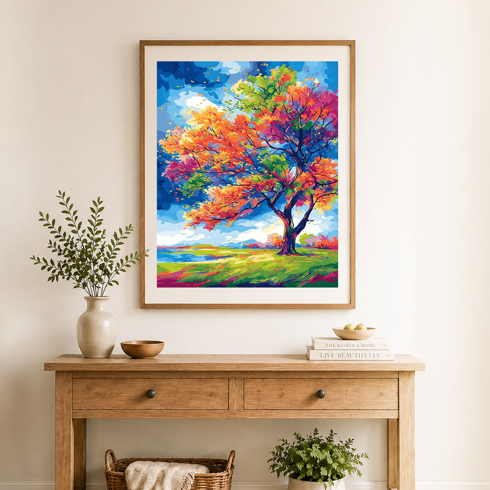 Finished vibrant rainbow foliage cross stitch artwork displayed as home decor