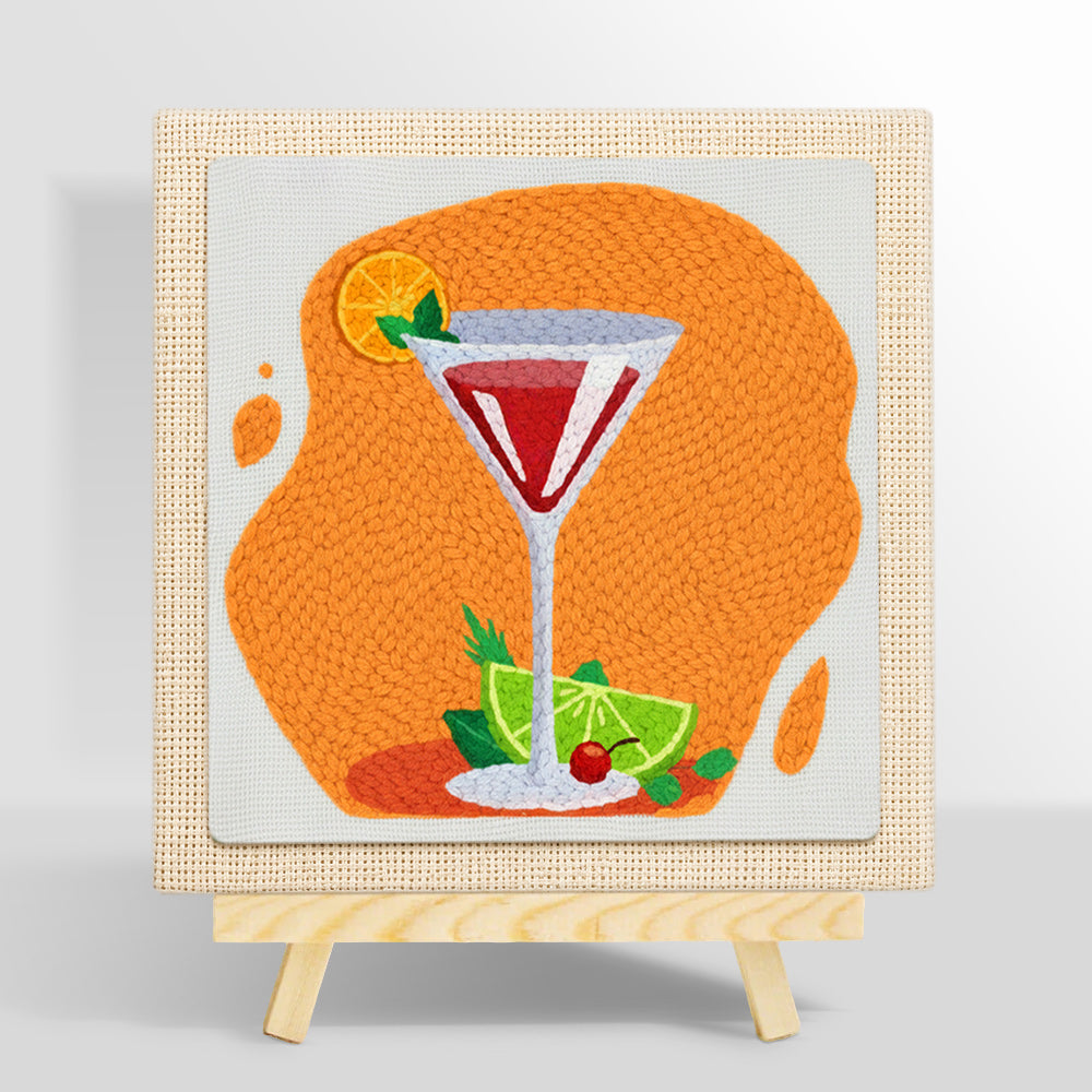Vibrant red cocktail with lime punch needle kit for beginners