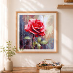 Finished vibrant red rose painting cross stitch artwork displayed as home decor