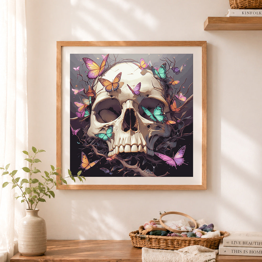 Finished vibrant skull with colorful butterflies cross stitch artwork displayed as home decor