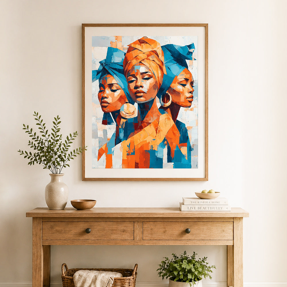 Finished vibrant tribal women cross stitch artwork displayed as home decor