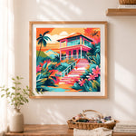 Finished vibrant tropical villa cross stitch artwork displayed as home decor