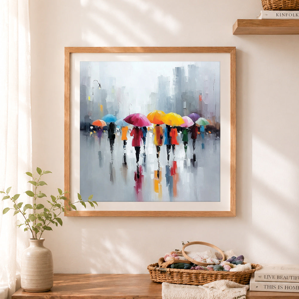 Finished vibrant umbrellas on a rainy street cross stitch artwork displayed as home decor