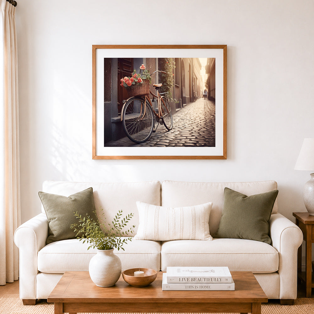 Finished vintage bicycle with roses cross stitch artwork displayed as home decor