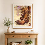 Finished vintage boots and wildflowers cross stitch artwork displayed as home decor