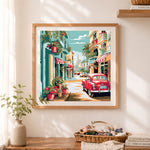 Finished vintage coastal street with classic car cross stitch artwork displayed as home decor