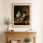 Finished vintage fruit wine still life cross stitch artwork displayed as home decor