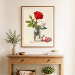 Finished vintage rose still life cross stitch artwork displayed as home decor