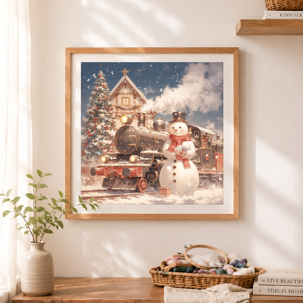 Finished vintage train and snowman cross stitch artwork displayed as home decor