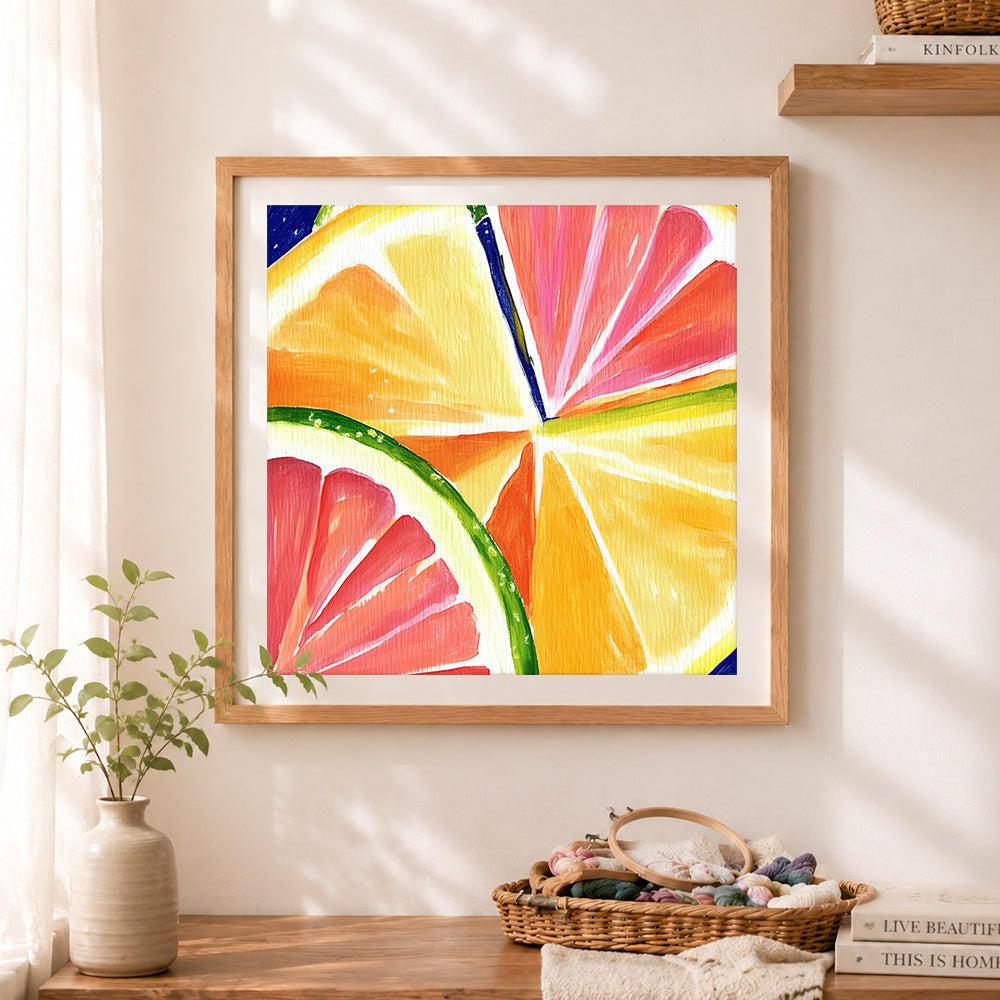 Finished vivid citrus slices painting cross stitch artwork displayed as home decor