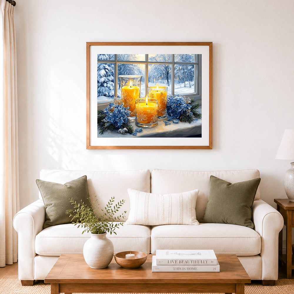 Finished warm candles and blue hydrangeas on winter windowsill cross stitch artwork displayed as home decor