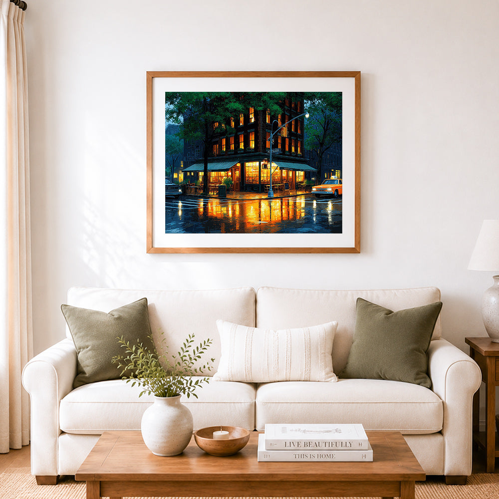 Finished warm city corner cross stitch artwork displayed as home decor