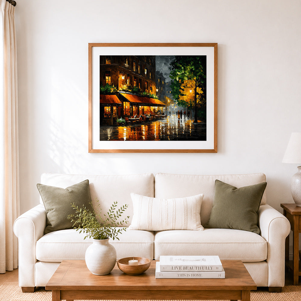 Finished warm light cafe on a rainy street cross stitch artwork displayed as home decor