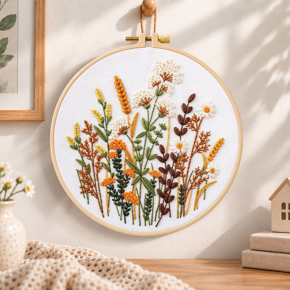 Warm tone dried florals embroidery hoop wall art displayed as warm and cozy handmade home decor