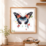 Finished watercolor butterfly cross stitch artwork displayed as home decor