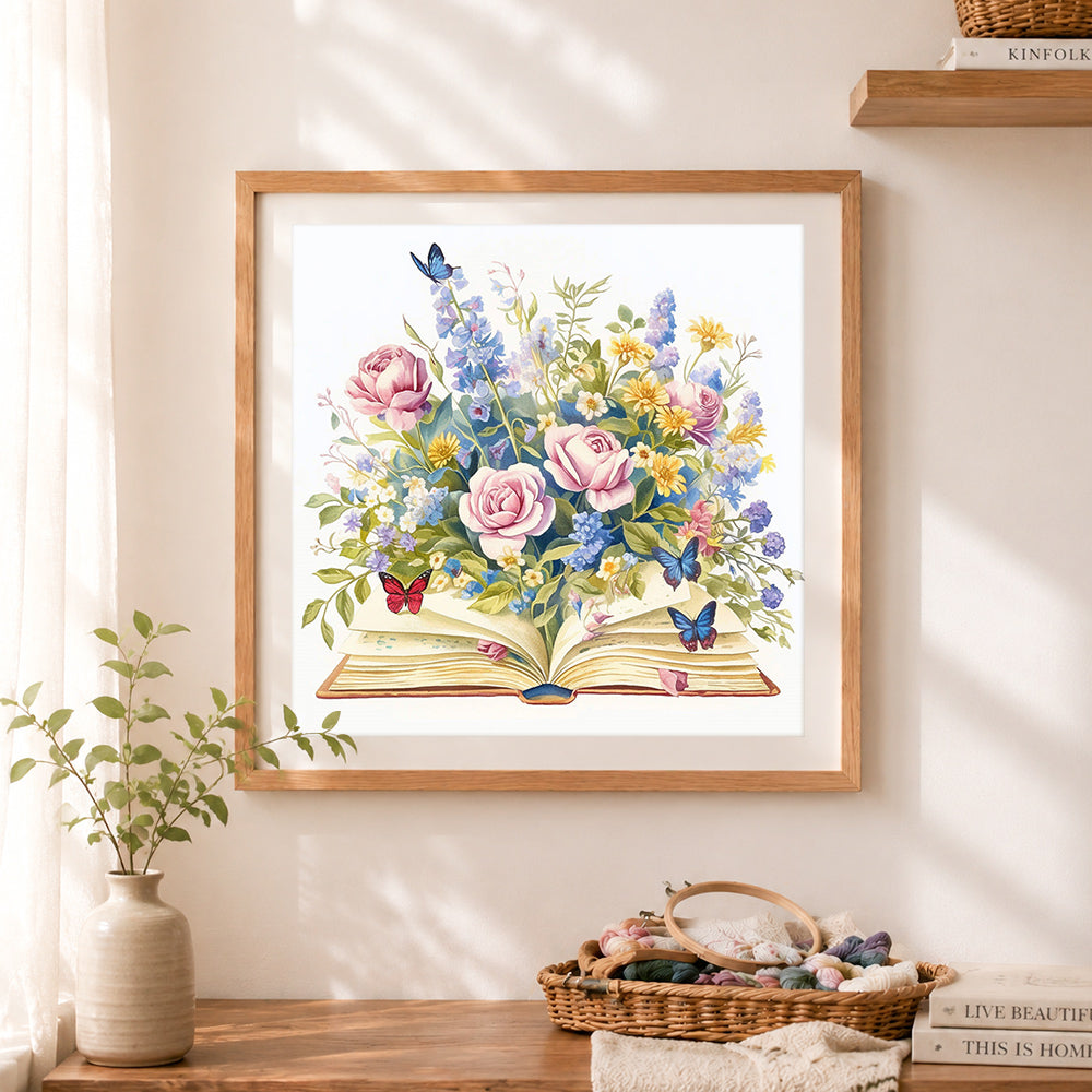 Finished watercolor roses and blue butterflies from a book cross stitch artwork displayed as home decor