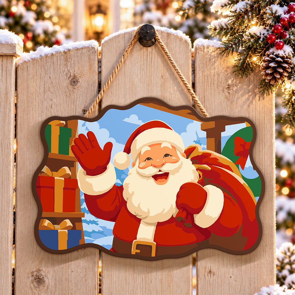 Waving santa with gift sack paint by numbers door hanger on a garden gate