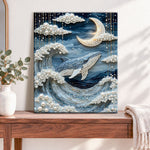 Finished whale under moon and clouds pearl diamond painting artwork displayed as home decor