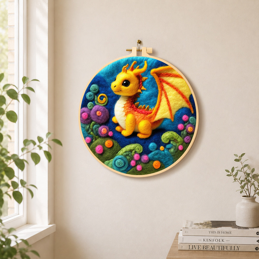 Whimsical baby dragon and colorful spiral plant needle felt wall art displayed in a bright home interior