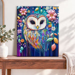 Finished whimsical colorful owl pearl diamond painting artwork displayed as home decor