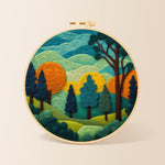 Whimsical forest and rolling mountains needle felting kit for beginners with a round wooden frame