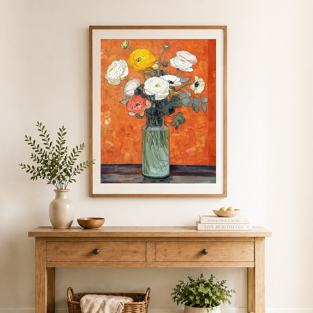 Finished white and yellow ranunculus in glass vase cross stitch artwork displayed as home decor