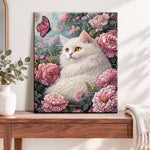 Finished white cat in peony pearl diamond painting artwork displayed as home decor