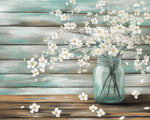 White flowers in teal jar on rustic wood cross stitch kit for beginners