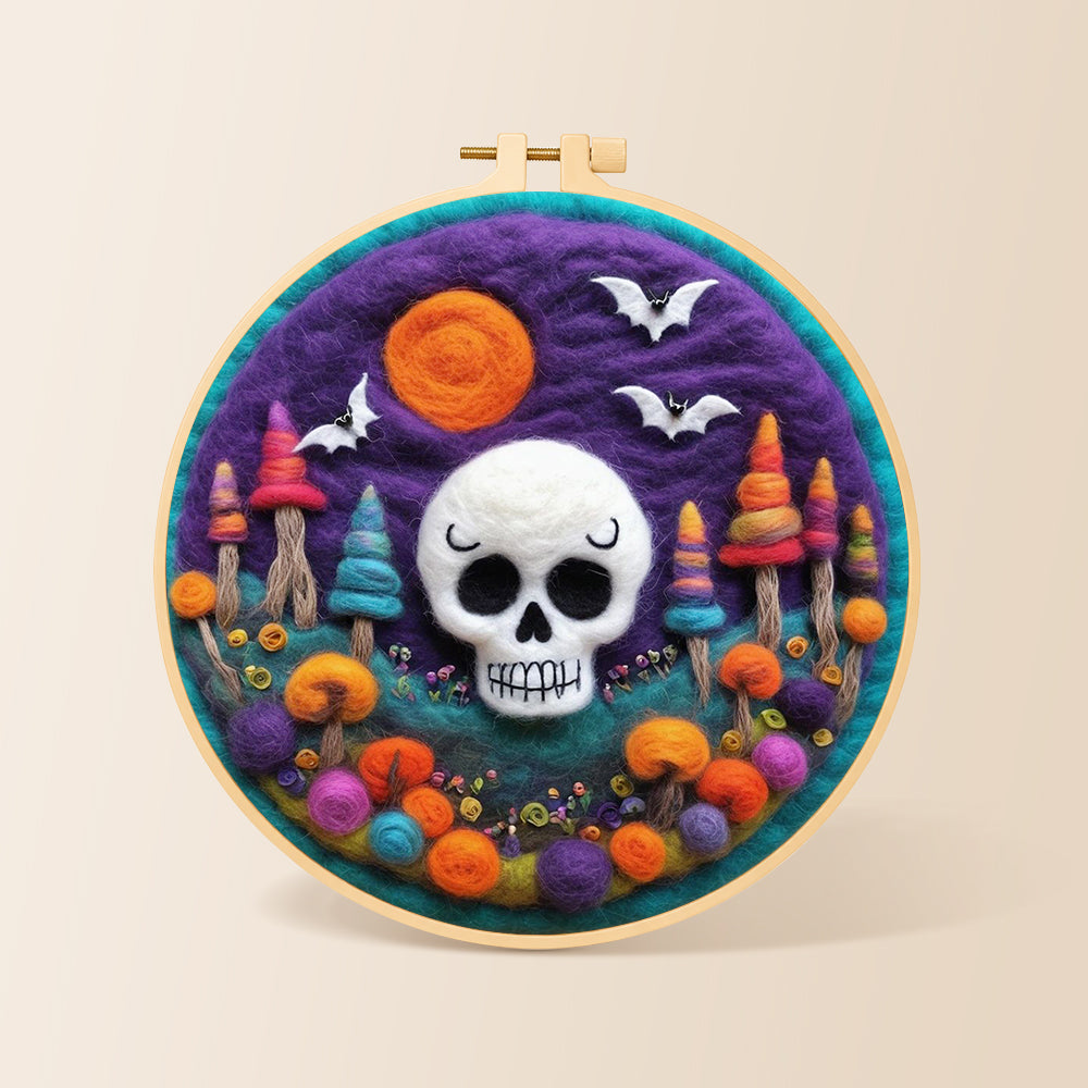 White skull with colorful mushroom trees needle felting kit for beginners with a round wooden frame
