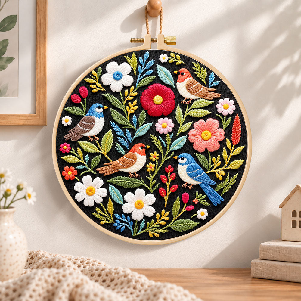Wild birds and mixed flowers embroidery hoop wall art displayed as warm and cozy handmade home decor