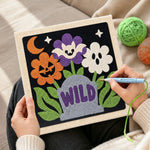 Creating handmade wild halloween blooms punch needle artwork