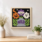 Finished wild halloween blooms artwork displayed on a wall