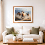 Finished wild horses running free cross stitch artwork displayed as home decor