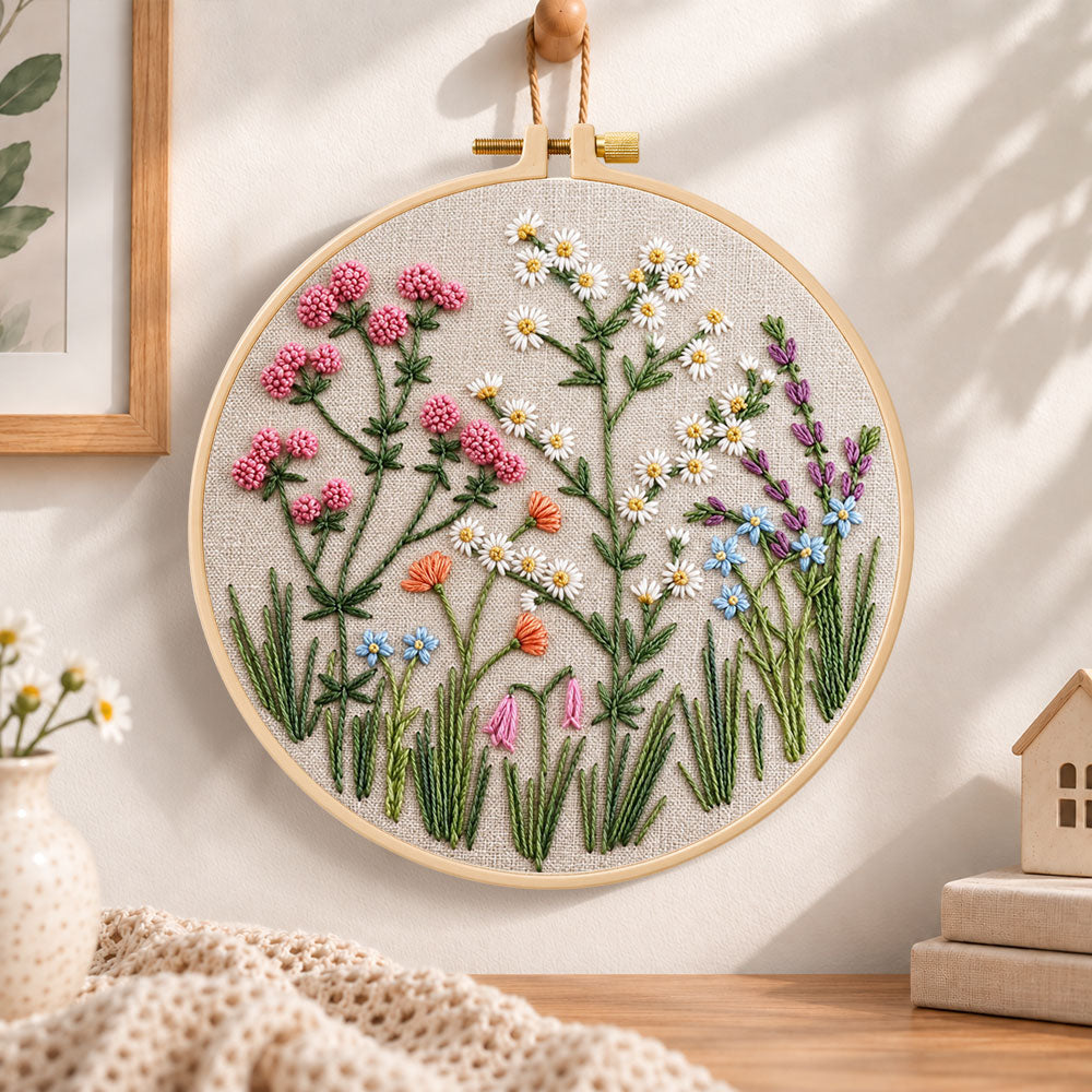 Wildflower blooms embroidery hoop wall art displayed as warm and cozy handmade home decor