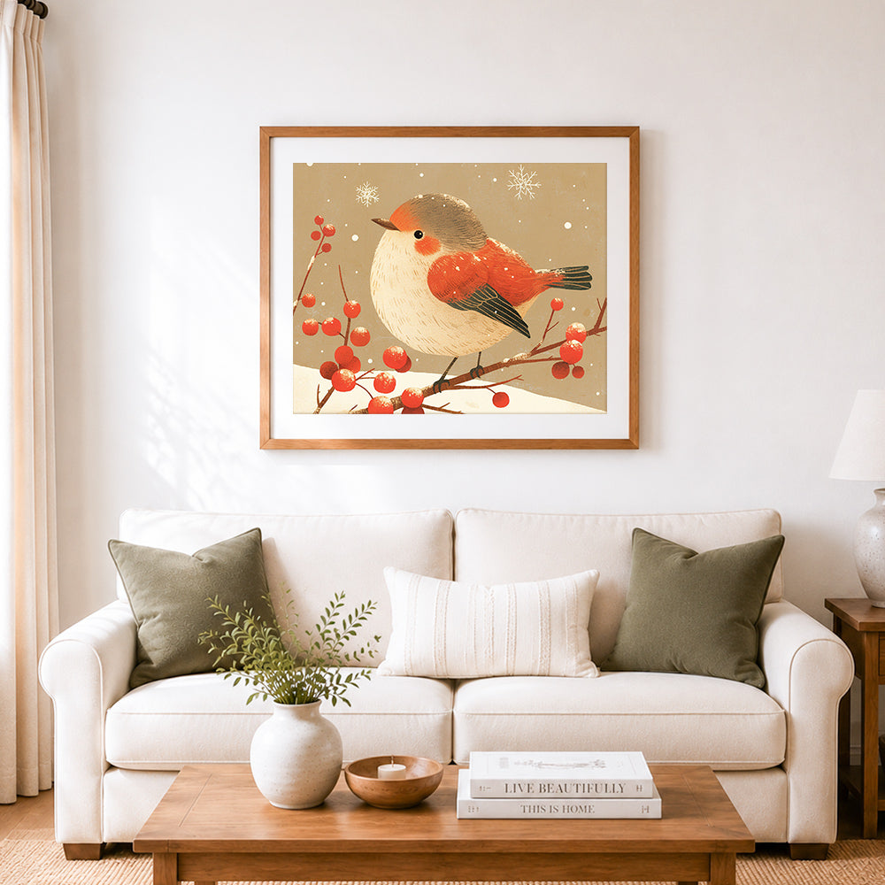 Finished winter bird on berry branch cross stitch artwork displayed as home decor