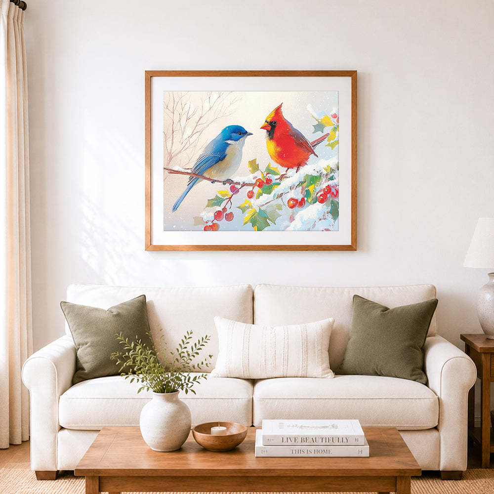 Finished winter birds on snowy branch cross stitch artwork displayed as home decor