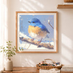 Finished winter bluebird in snow cross stitch artwork displayed as home decor