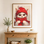 Finished winter fluffy kitten cross stitch artwork displayed as home decor