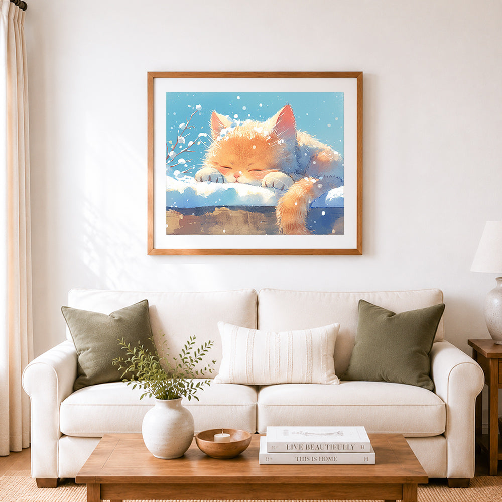 Finished winter ginger kitten cross stitch artwork displayed as home decor