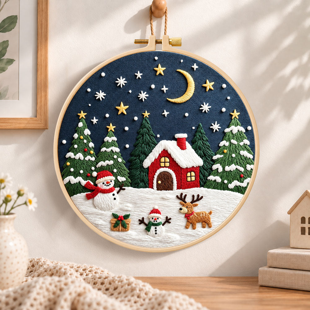 Winter night christmas scene embroidery hoop wall art displayed as warm and cozy handmade home decor