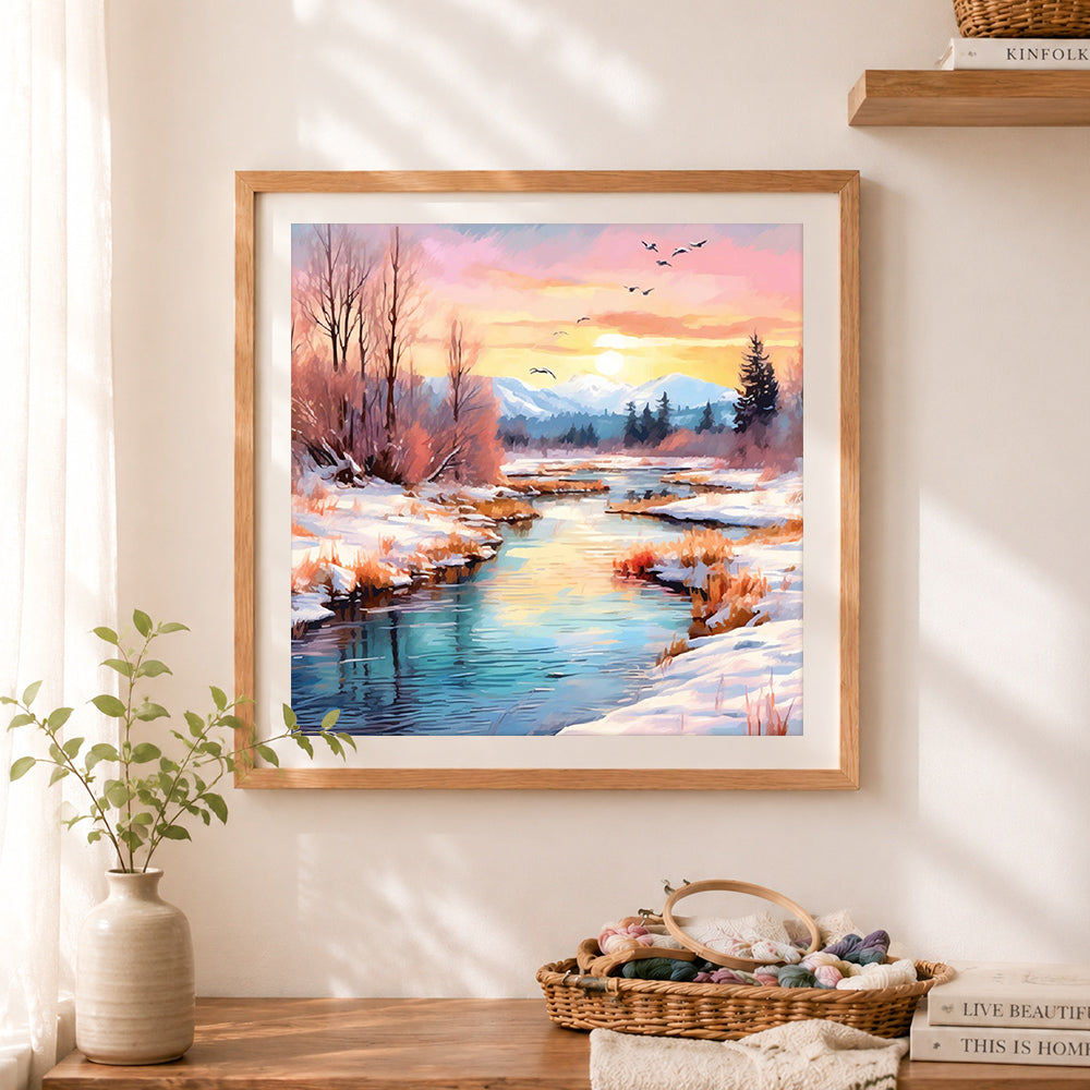 Finished winter river sunset with flying birds cross stitch artwork displayed as home decor