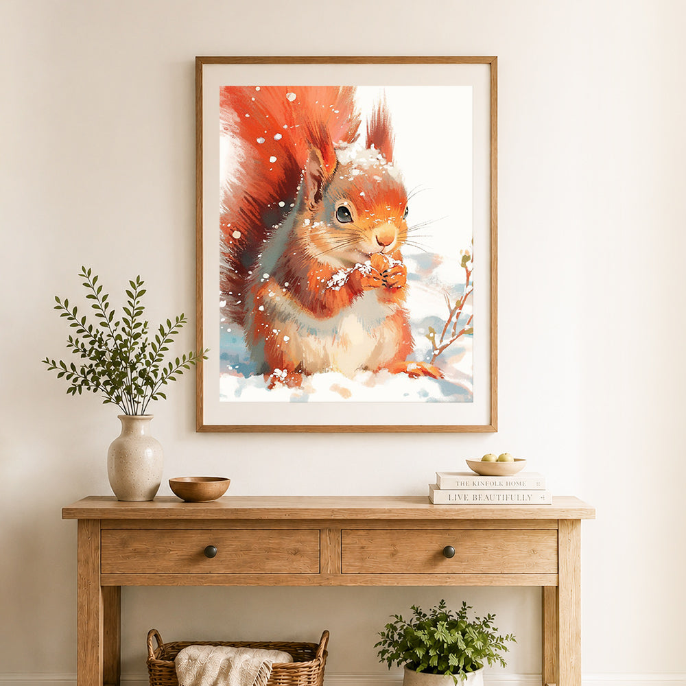 Finished winter squirrel in snow cross stitch artwork displayed as home decor