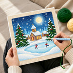 Creating handmade winter village ice skating punch needle artwork