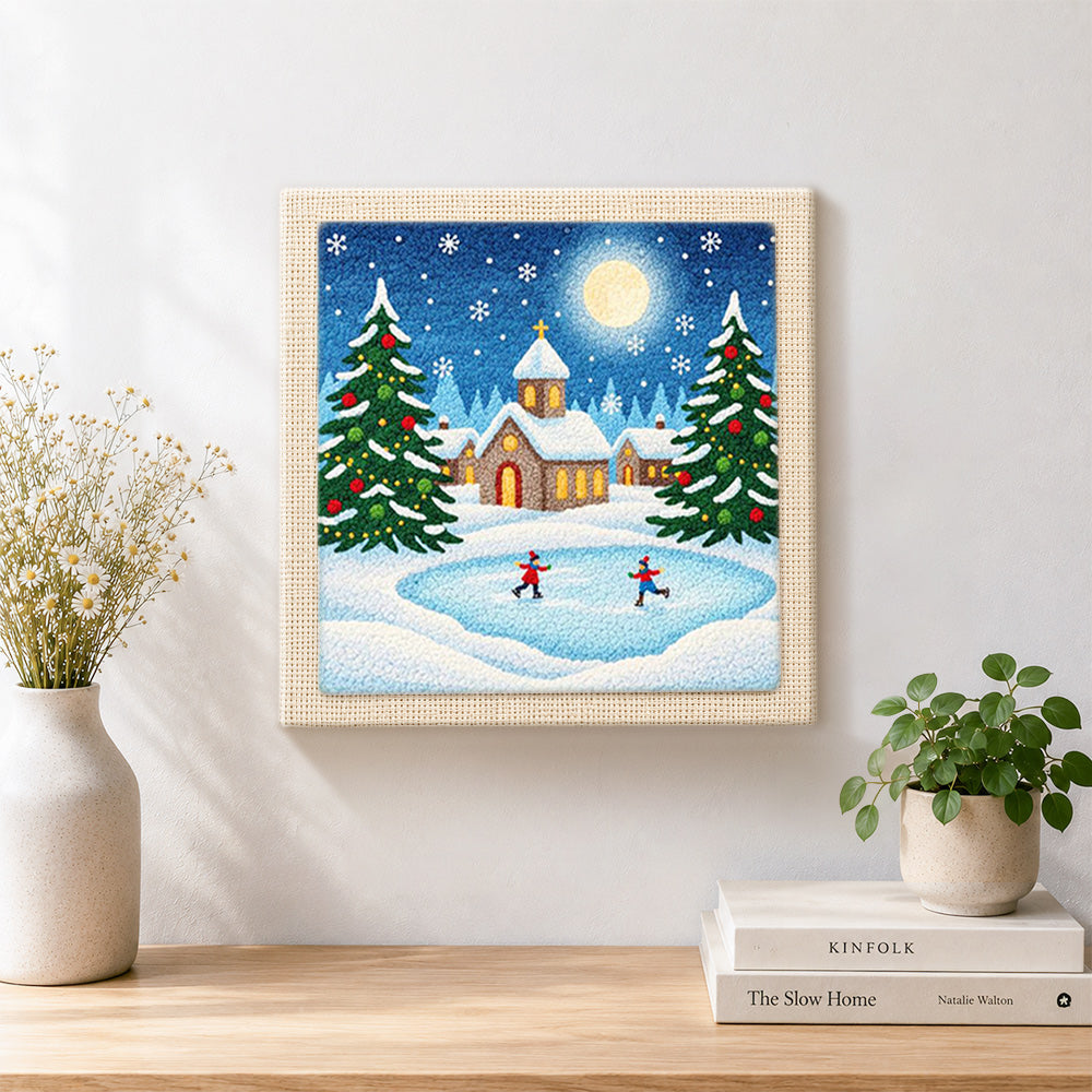 Finished winter village ice skating artwork displayed on a wall
