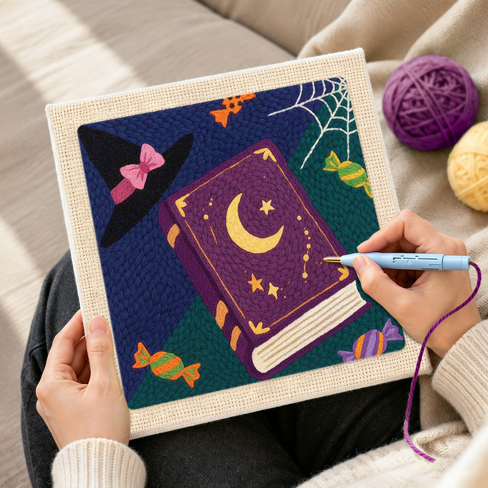 Creating handmade witch book and candies punch needle artwork